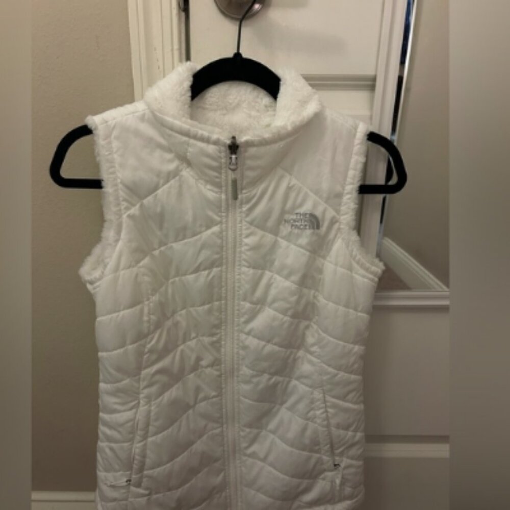 The North Face 
White reversible puffer vest